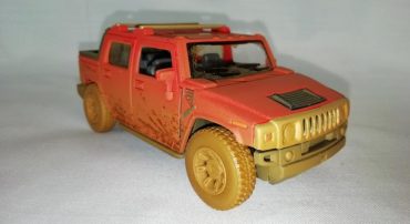 (خاکی) ماکت ماشین اسباب بازی هامر (HUMMER 2005 H2 SUT BY KINSMART)