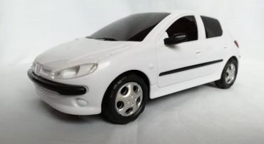ماشین پژو 206 هوشمند (موزیکال- چراغدار- باطری خور- چرخشی) 1:24 سفید