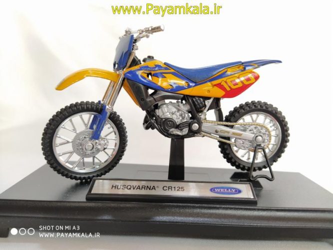 ماکت فلزی موتورسیکلت هسکوارنا(HUSQVARNA CR125 BY WELLY)(1/18)