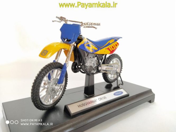 ماکت فلزی موتورسیکلت هسکوارنا(HUSQVARNA CR125 BY WELLY)(1/18)