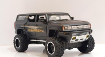 ماشین فلزی هامر HUMMER EV مشکی | ماکت شاسی‌بلند چراغدار و موزیکال 1:24